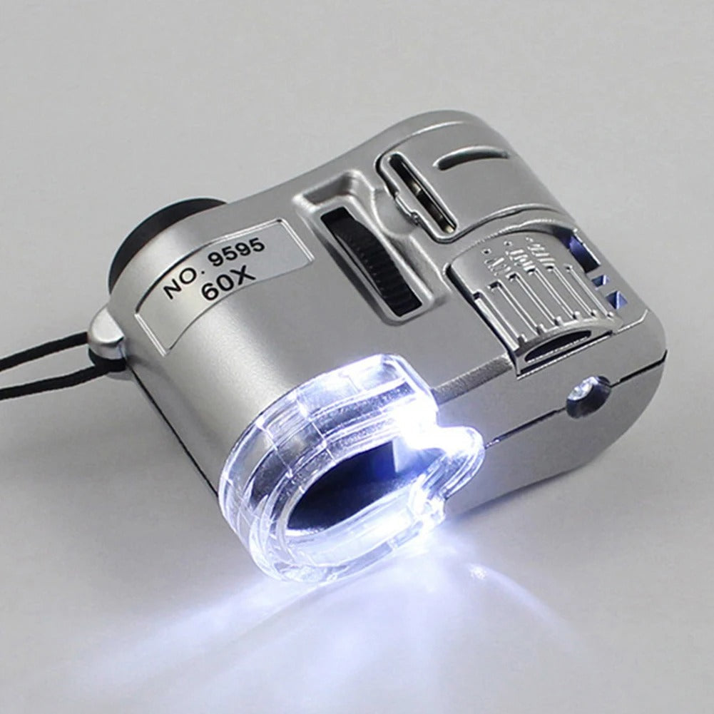 Silverfärgat 60x förstoringsglas med inbyggd LED-belysning